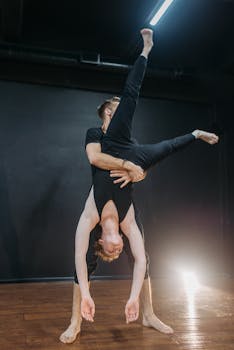 Elegant acrobatic dance performance showcasing a duo's grace and skill.